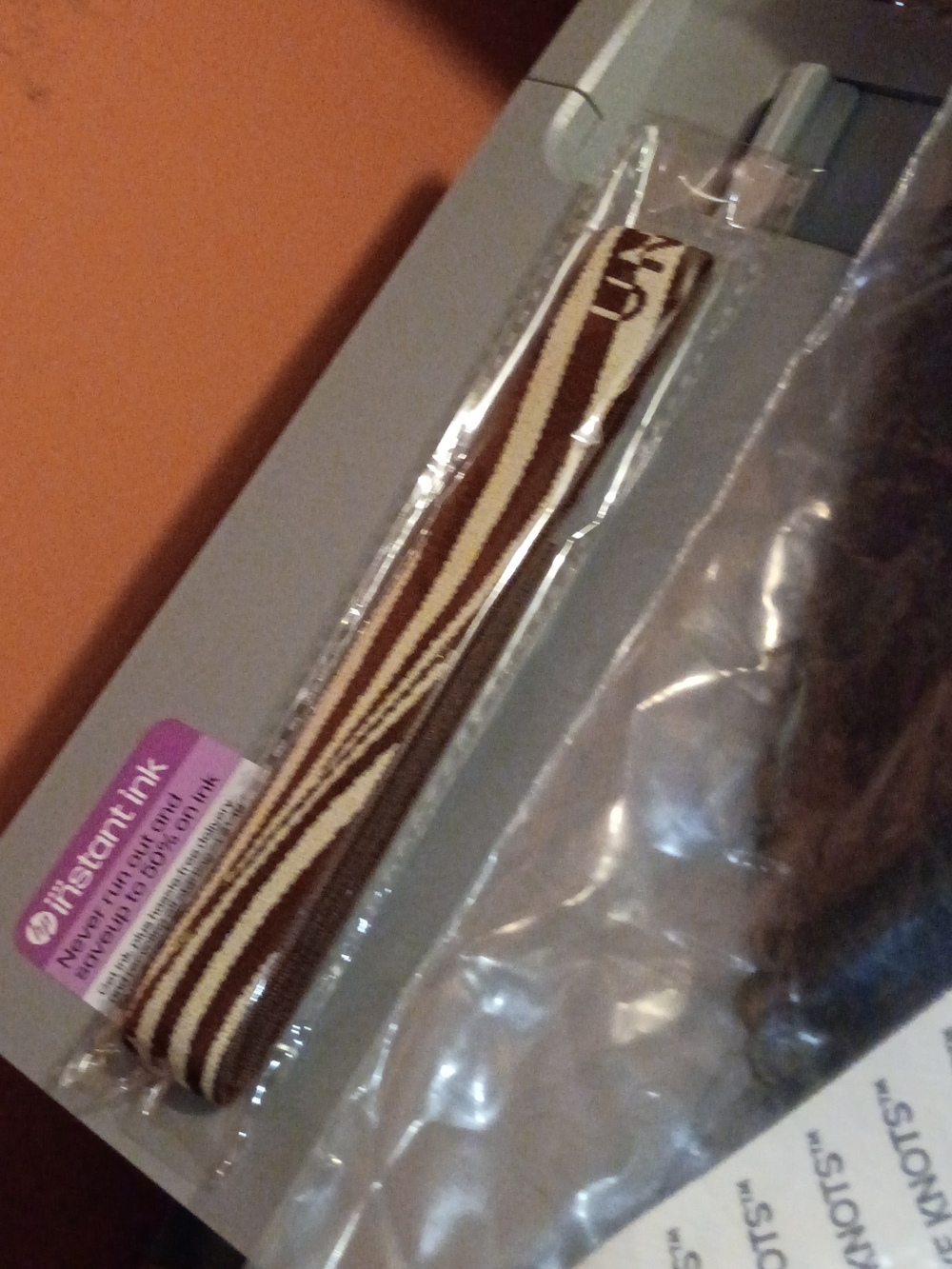 Zebra-Pattern Phone Wrist Strap — Brown & Cream